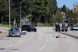 Crash injures 2, closes Hastings Street in Burnaby, RCMP say