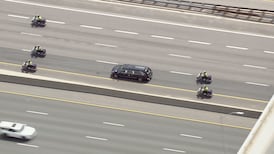 Body of OPP officer killed in Highway 401 crash transported to Oshawa funeral home