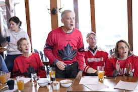 Carney watching Canada-U.S. gold medal hockey game with friends, family at the pub