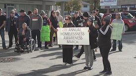 Dozens march in Surrey to raise awareness about homelessness